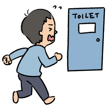 トイレに駆け込む男性のイラスト